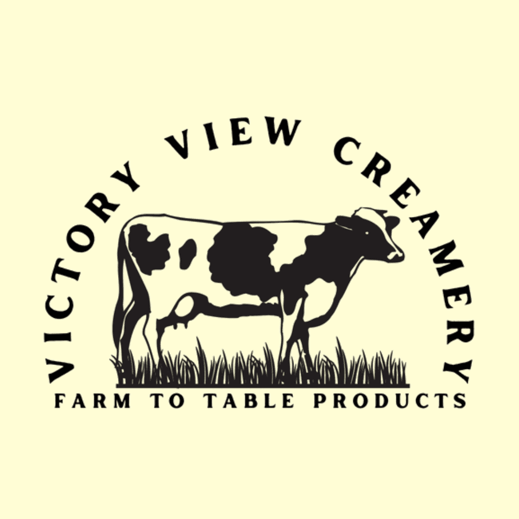 Logo for Victory View Creamery featuring a black and white cow standing on grass, with the text FARM TO TABLE PRODUCTS below the cow. The design has a rustic and agricultural feel.